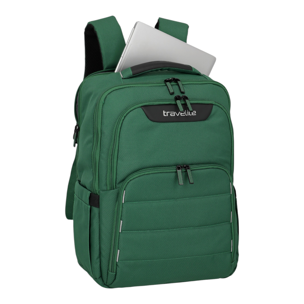 Lieblingstasche Skaii Rucksack M in green with a laptop inside, featuring multiple zippered compartments.