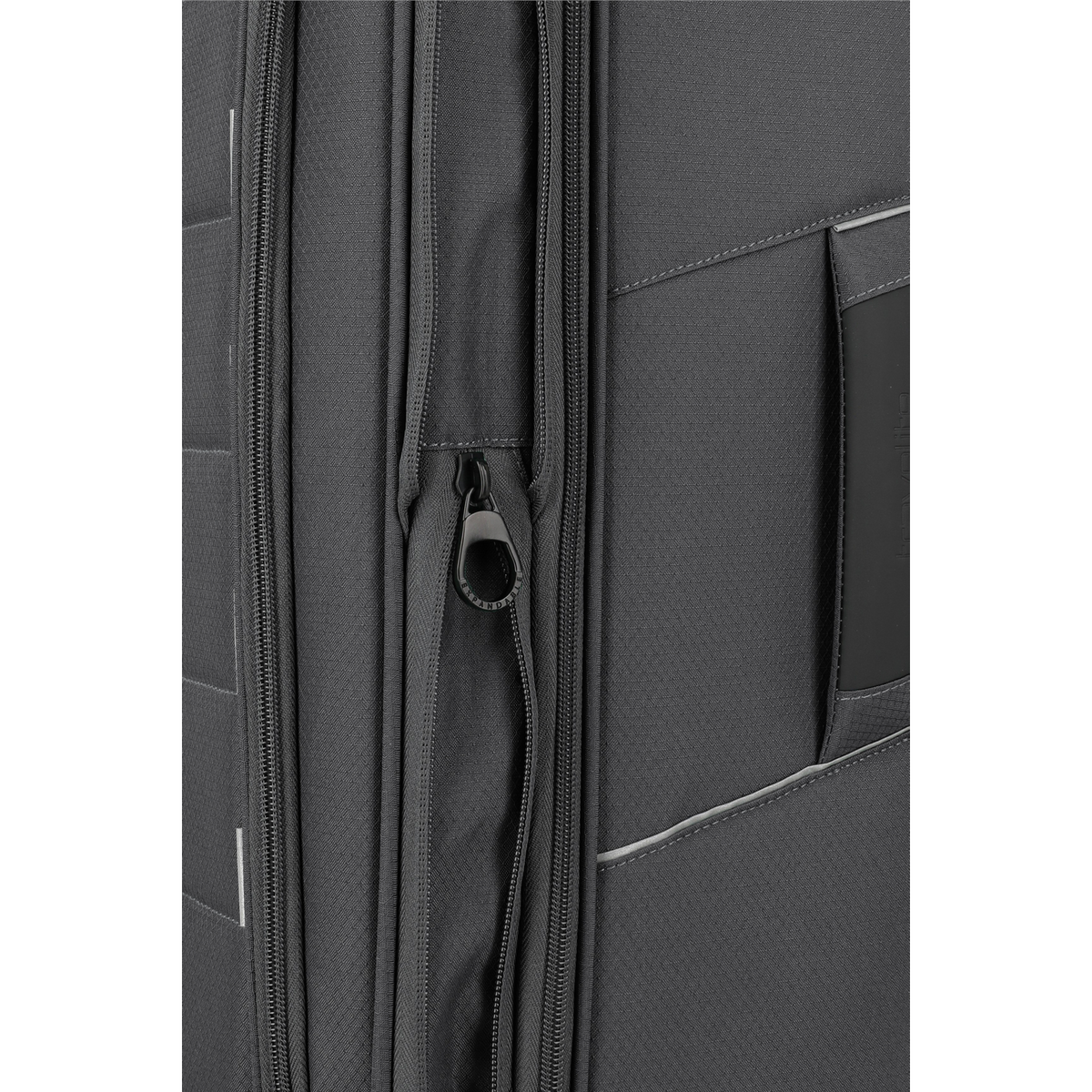 Close-up of the Lieblingstasche Skaii Trolley 4W L exp showing the durable grey fabric and expandable zipper detail.