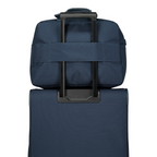 Lieblingstasche Skaii Weekender in navy blue attached to a matching suitcase handle for easy travel