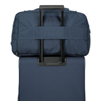 Lieblingstasche Skaii weekender rucksack in navy blue attached to a rolling suitcase handle for travel.