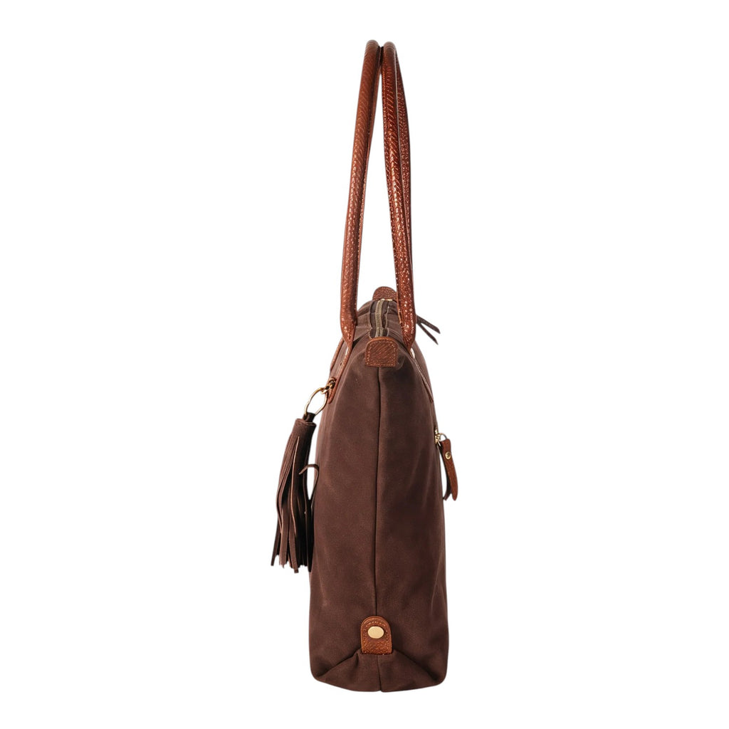 Lieblingstasche Sofia L brown canvas tote bag with braided leather handles and tassel detail.