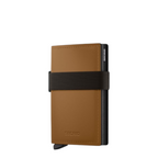 Lieblingstasche Bandwallet Matte in tan leather with a black elastic strap and Secrid card mechanism