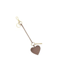 Lieblingstasche heart charm in taupe leather with gold-toned hardware and a small logo tag on a keyring