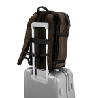 Lieblingstasche Tidy22 brown business backpack attached to a silver suitcase handle for travel