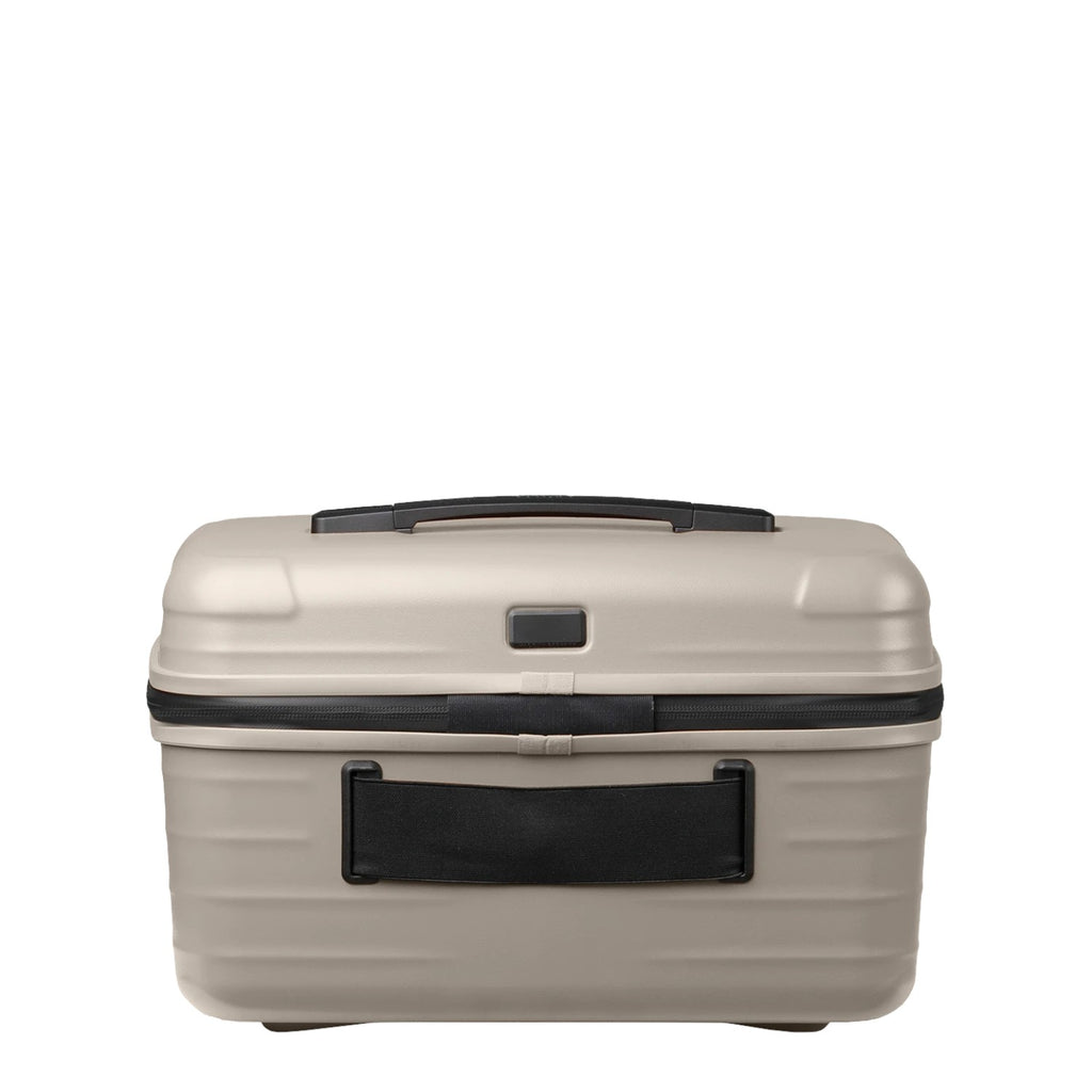 Lieblingstasche UPGRADE beautycase in a neutral beige hard-shell design with a black handle and zipper detail.