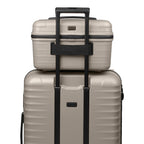 Lieblingstasche UPGRADE beautycase in beige hard shell material attached to a matching suitcase handle
