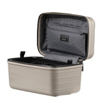 Lieblingstasche UPGRADE beautycase in beige with a hard shell, open lid, and organized interior compartments.