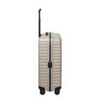 Lieblingstasche UPGRADE 4w Trolley M in beige with a hard shell, vertical ridges, and black telescopic handle.