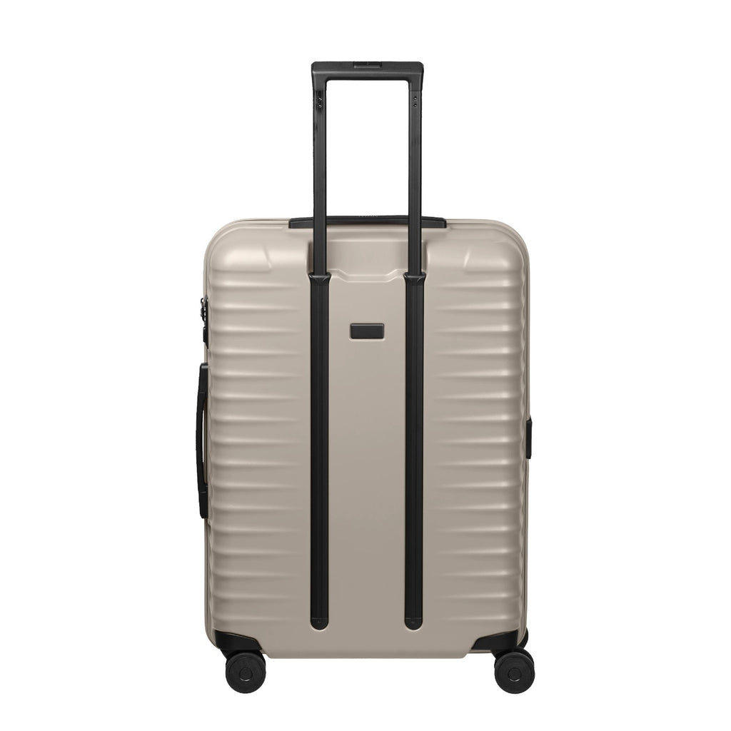 Lieblingstasche UPGRADE 4w Trolley M+ in beige with a hard shell, telescopic handle, and four spinner wheels.