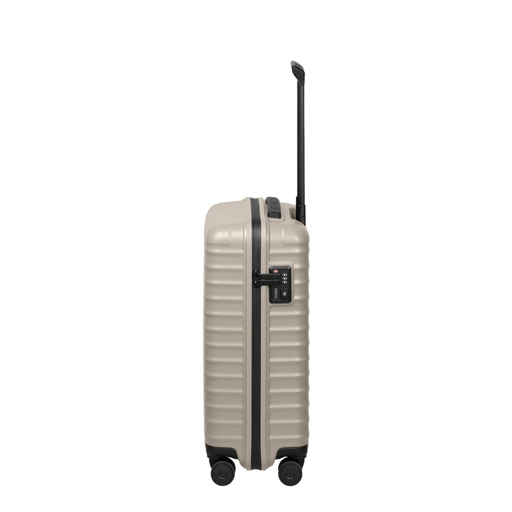 Lieblingstasche UPGRADE 4w Trolley S20 in beige with a hard shell, side handle, and TSA lock on a black background