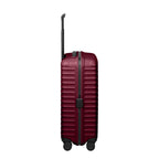 Lieblingstasche UPGRADE 4w Trolley M in dark red with a hard shell, telescopic handle, and four spinner wheels