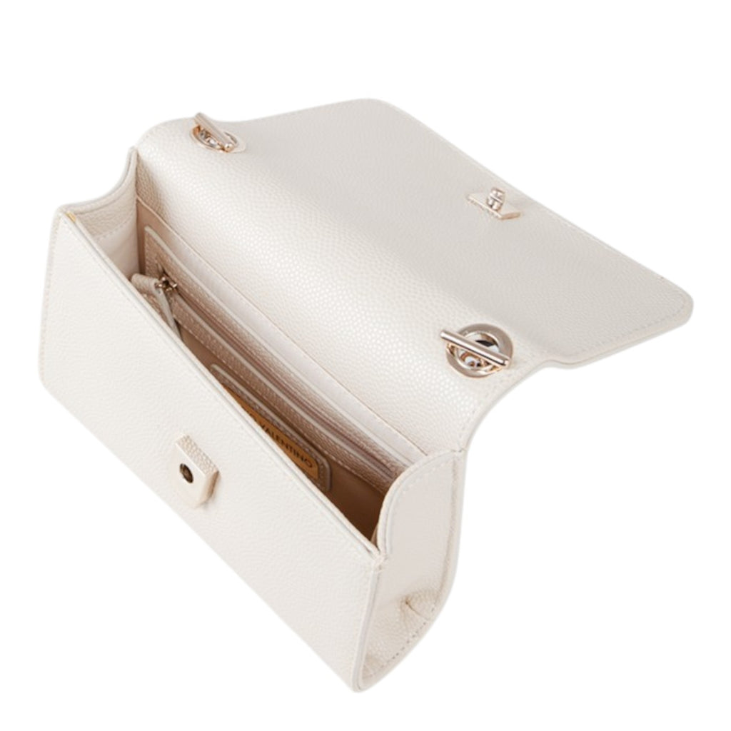 Lieblingstasche white pebbled leather Pochette Divina clutch with gold hardware and chain strap, open to show interior.